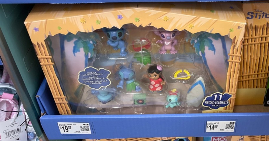 a Disney Lilo & Stitch figure set in the box on a store display