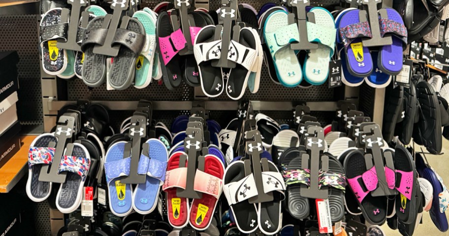 display rack full of under armour slides in variosu colors