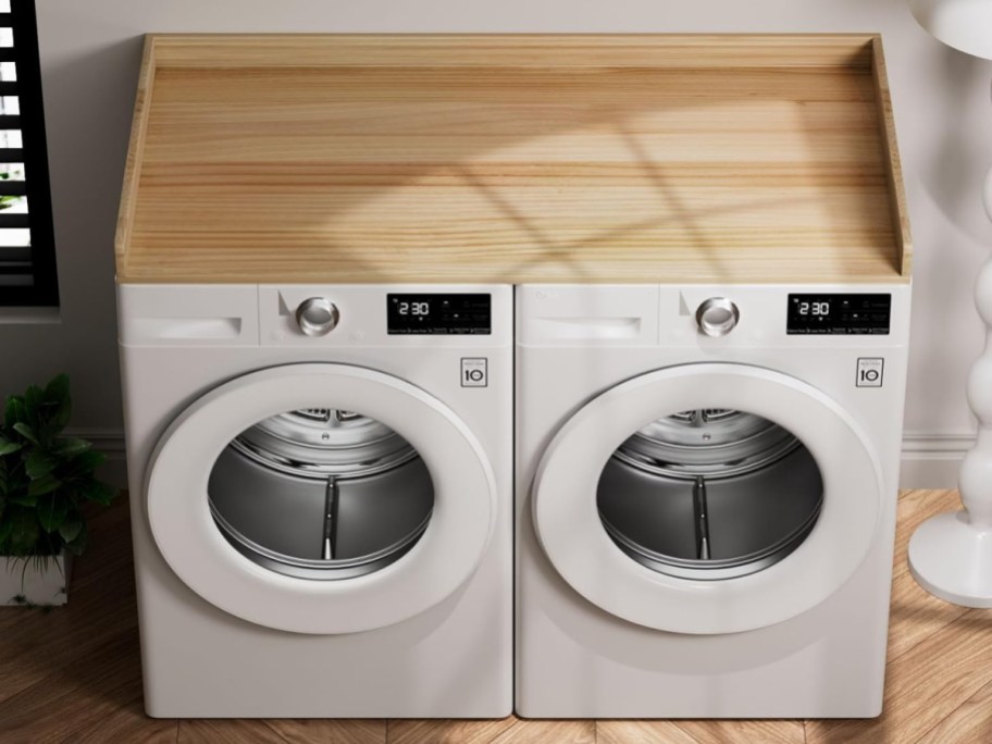 natural color wood shelf on top of washer and dryer
