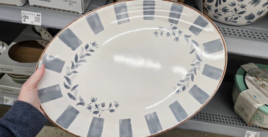 hand holding serving platter